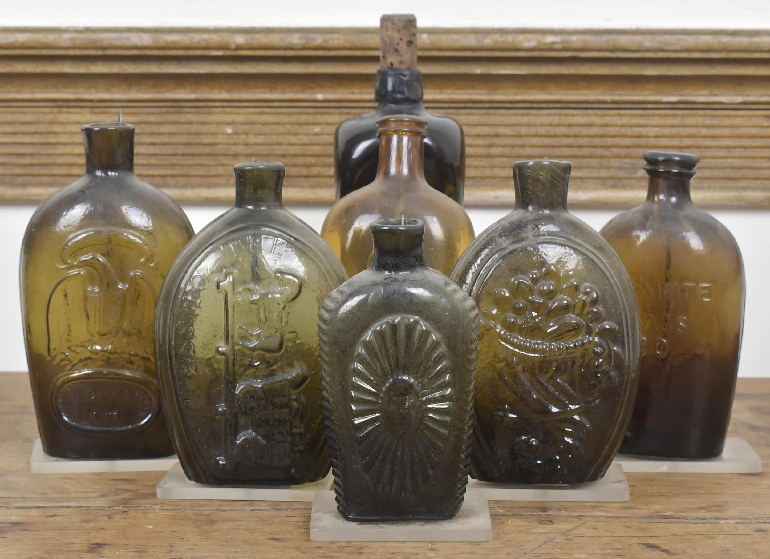 Appraisal: SEVEN ANTIQUE BOTTLES Collection of seven antique bottles and flasks