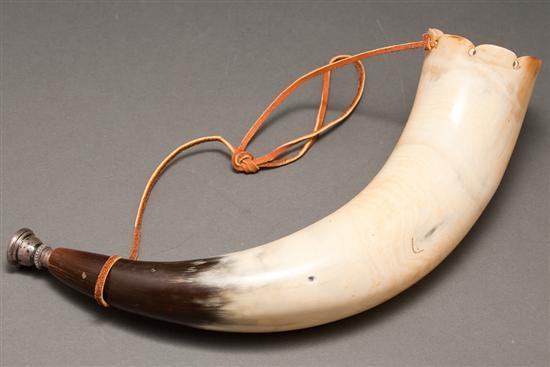 Appraisal: Carved hunting horn with silver mouth piece and leather strap