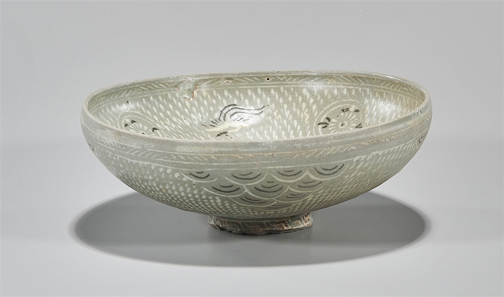 Appraisal: Korean celadon glazed elaborately designed bowl with birds flowers and