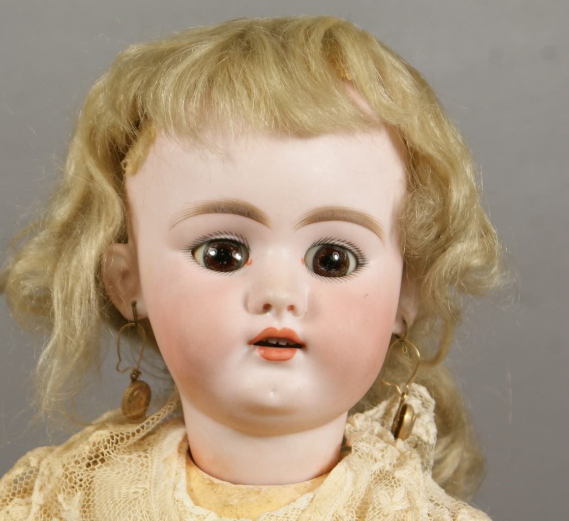 Appraisal: Bisque Socket Head Doll incised brown glass sleep eyes open