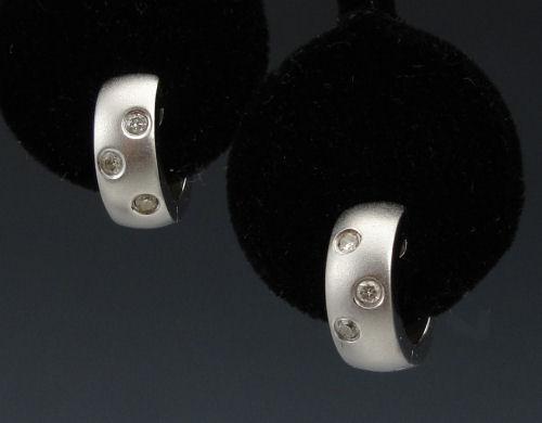 Appraisal: K AND DIAMOND HUGGIE EARRINGS K white gold Huggie style