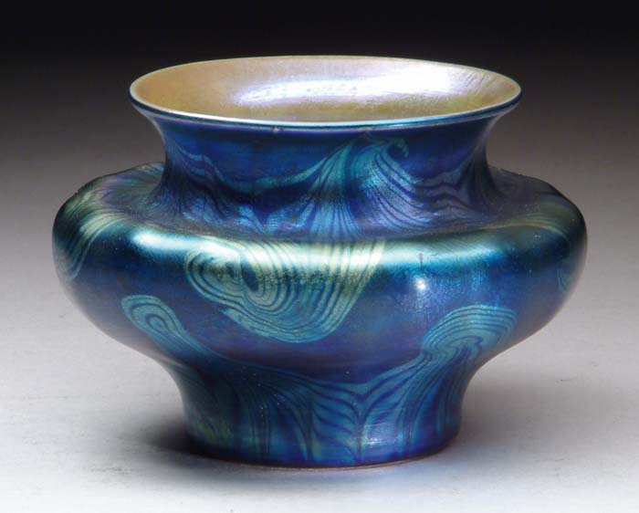 Appraisal: TIFFANY STUDIOS DECORATED VASE Beautiful blue Favrile vase has swirling