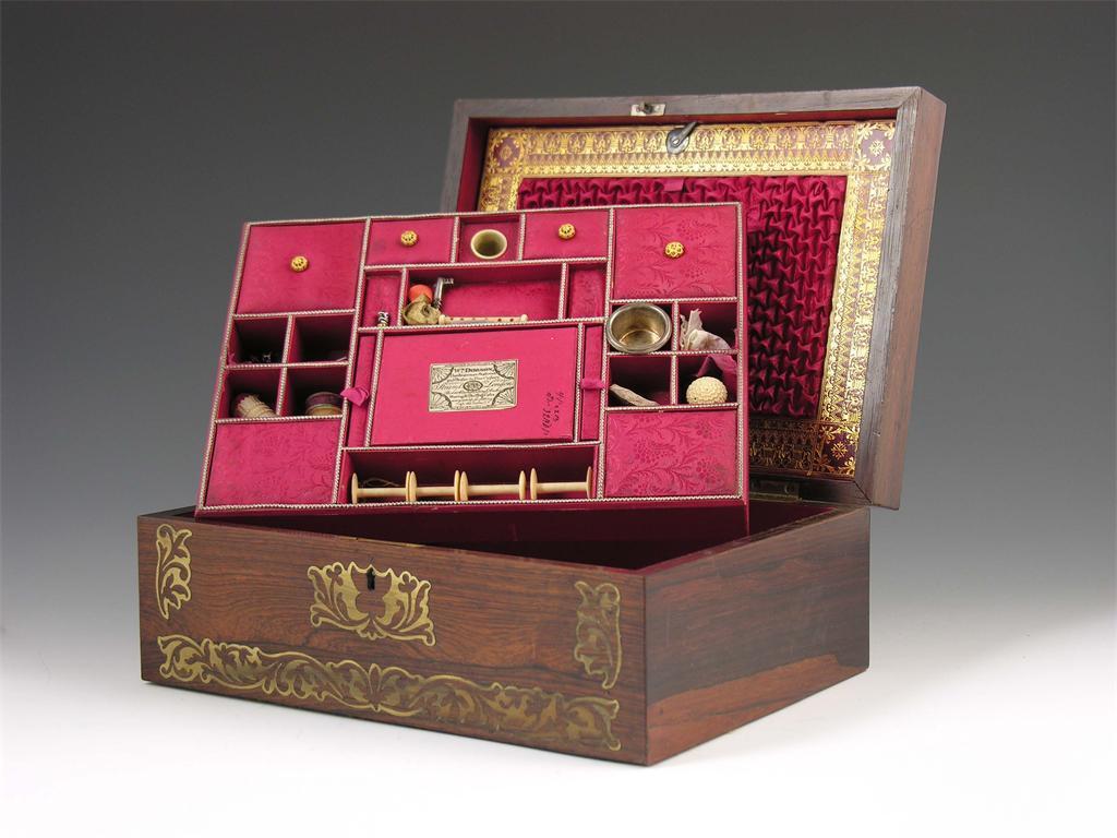 Appraisal: An early Victorian rosewood and brass marquetry sewing box by