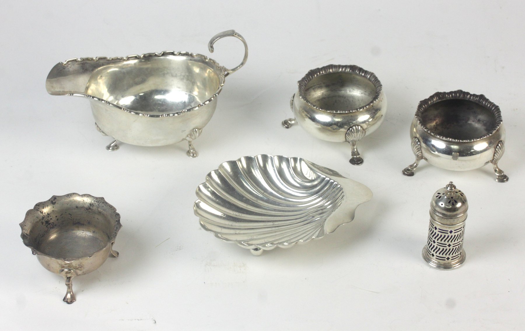 Appraisal: A silver sauce boat Elkington Co Birmingham a pair of