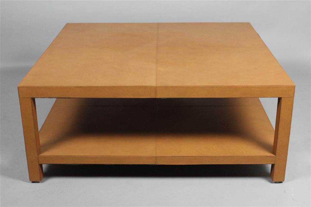 Appraisal: CONTEMPORARY TAN LEATHER LOW TABLE ESTATE OF TOM CLANCY the