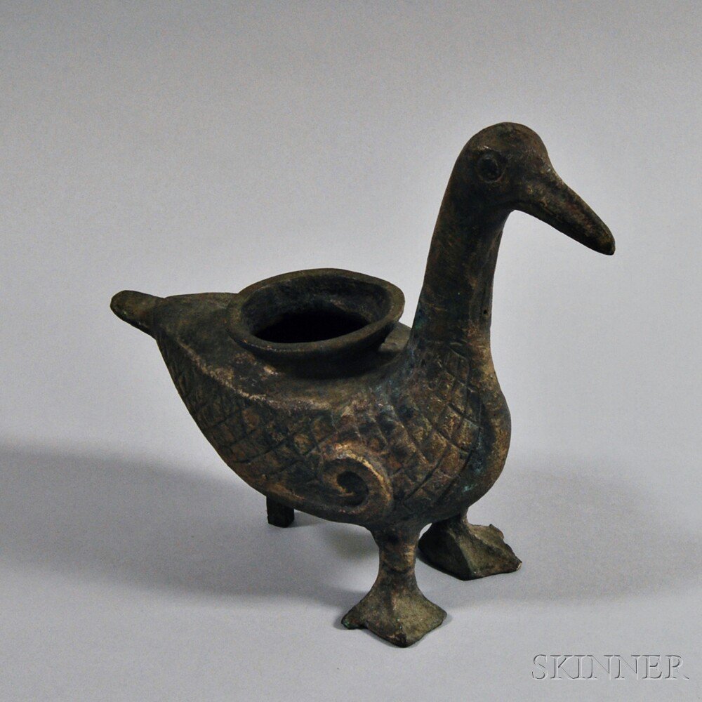 Appraisal: Chinese Bronze Duck Vessel resting on two webbed feet and