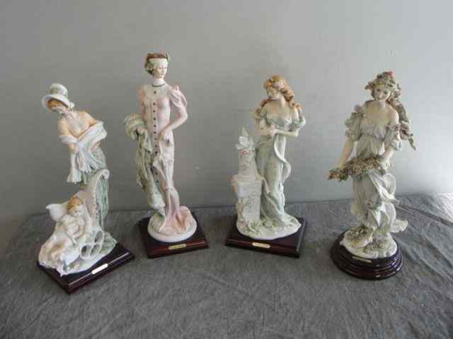 Appraisal: GIUSEPPI ARMANI Capodimonte Porcelain Figures Made in Florence From a