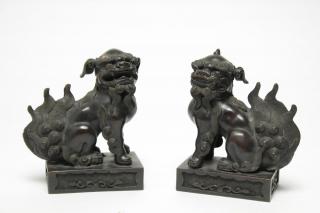 Appraisal: Chinese Foo Dogs or Lions Bronzed Metal Pair Chinese foo