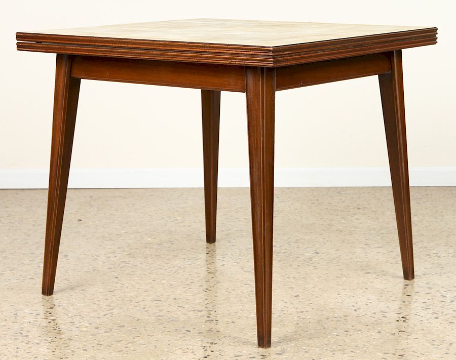 Appraisal: FLIP TOP DINING TABLE MANNER OF TOMMI PARZINGER An unusual