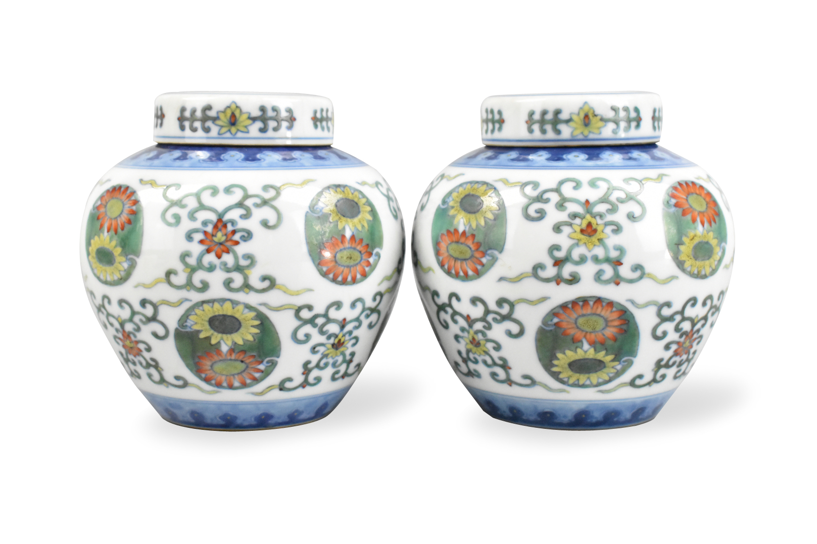 Appraisal: A pair of Chinese doucai glazed jars with covers Dated