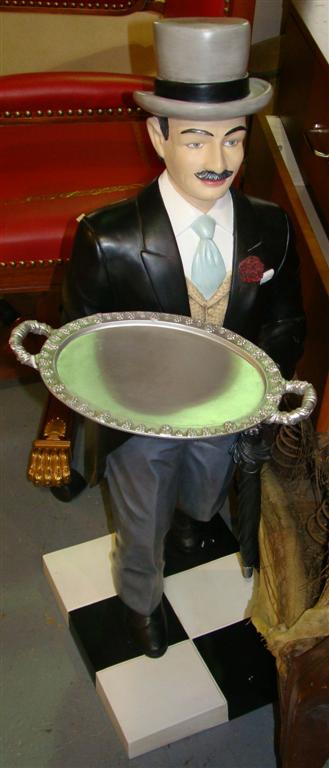 Appraisal: BUTLER FORM LETTER TRAY Modeled as a butler in top