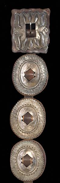 Appraisal: A Navajo concha belt A first phase-style revival example consisting