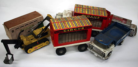 Appraisal: A TRI-ANG CIRCUS ON TOUR painted tin plate truck and