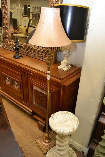 Appraisal: AN EMPIRE STYLE GILDED STANDARD LAMP WITH SHADE AN EMPIRE