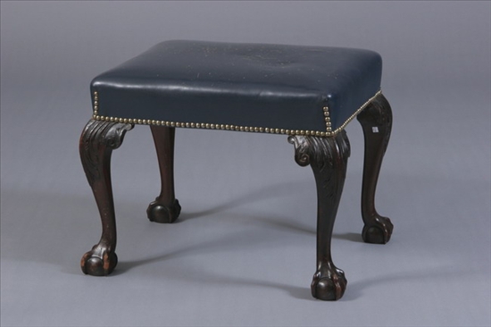 Appraisal: GEORGIAN LEATHER-UPHOLSTERED STOOL th century assembled from old parts Padded