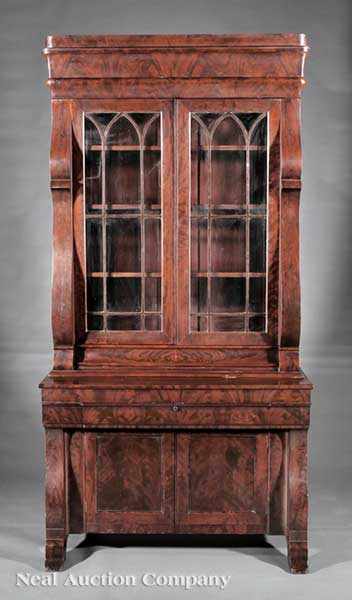 Appraisal: An American Restauration Carved Mahogany Secretary Bookcase early th c