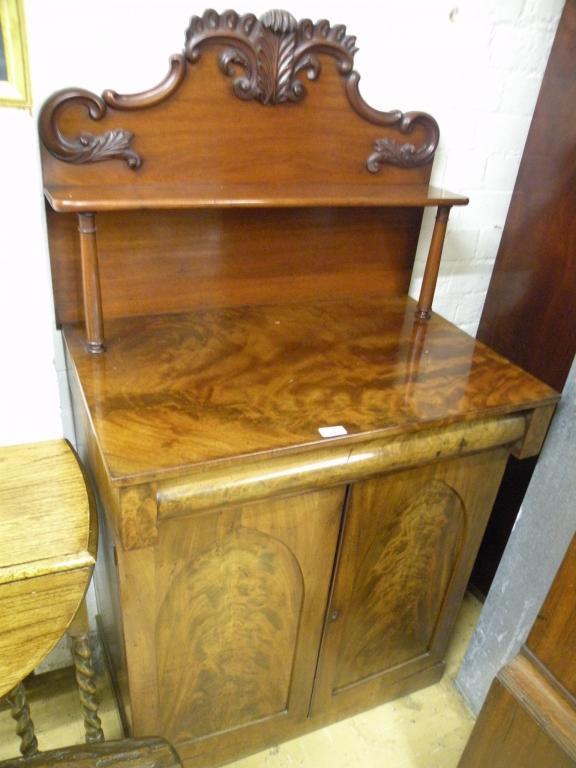 Appraisal: An early Victorian mahogany chiffonier the raised back shelf with