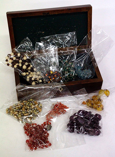 Appraisal: AN ANTIQUE WORKBOX AND CONTENTS THEREIN including necklaces faux amber