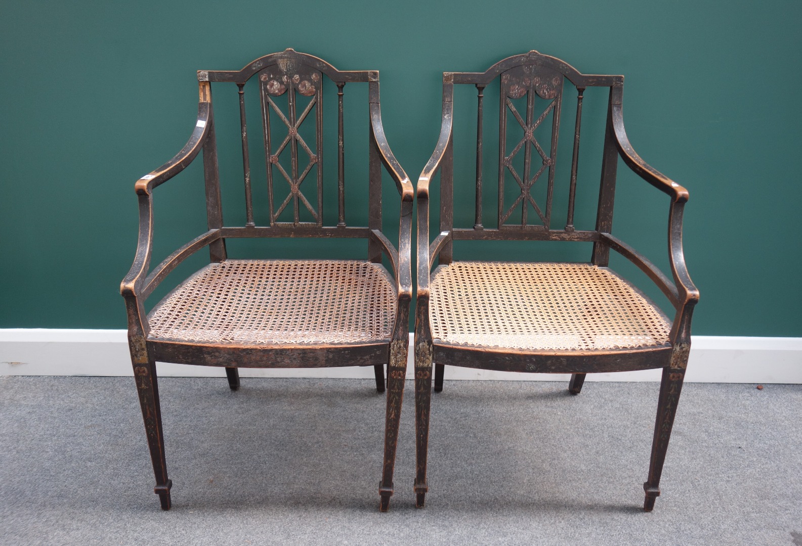 Appraisal: A pair of Regency painted elbow chairs with downswept arms