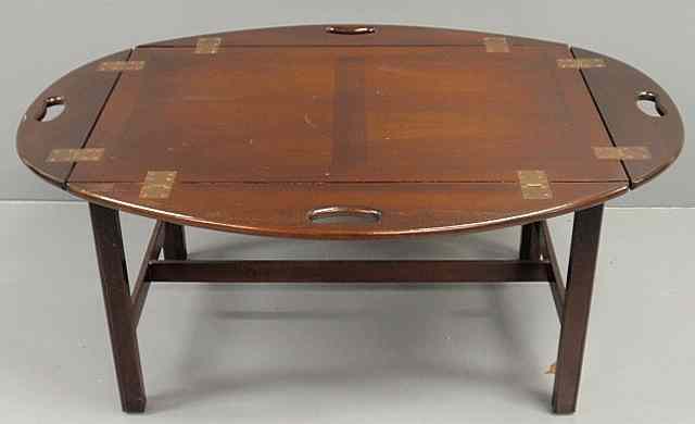 Appraisal: Chippendale style mahogany butler's table h top x open