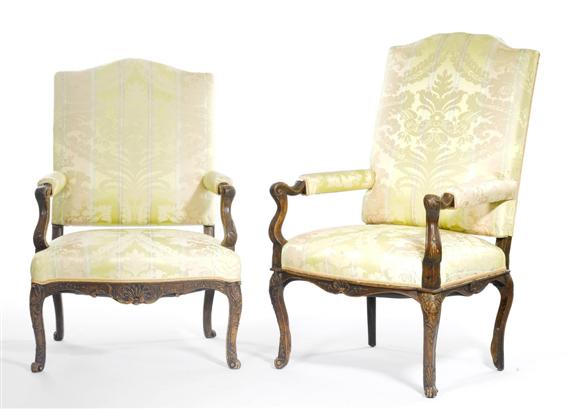 Appraisal: SIMILAR ARMCHAIRS R gence France Carved beech Yellow patterned silk