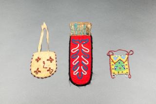 Appraisal: Three Native American Miniature Bags A small beaded bag sewn