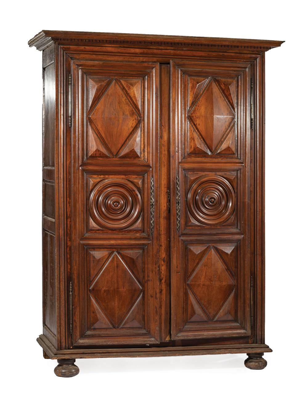 Appraisal: French Provincial Carved Walnut Armoire th c dentilated cornice paneled