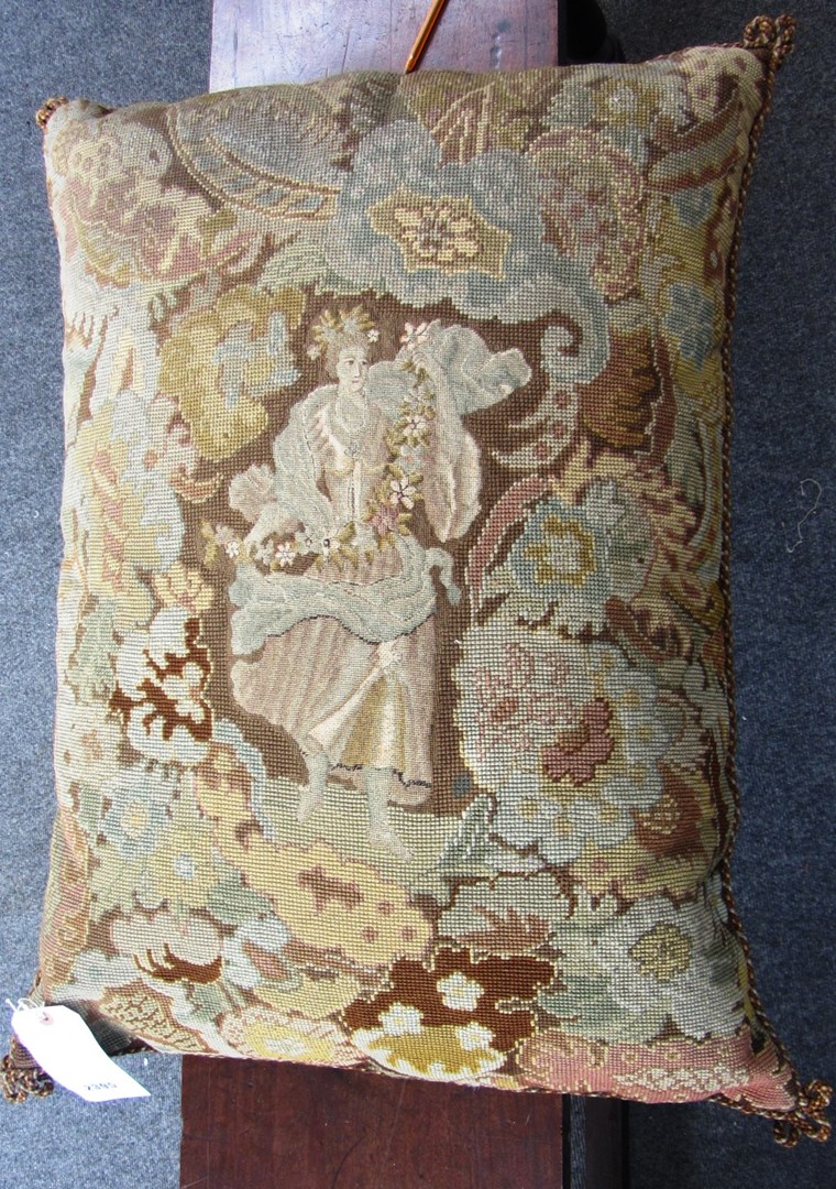 Appraisal: A large woolwork embroidered cushion early th century depicting a