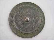 Appraisal: A Chinese plated bronze mirror cm diameter