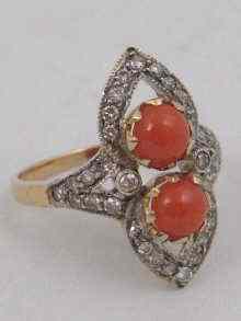 Appraisal: A yellow metal tests carat gold coral and diamond ring