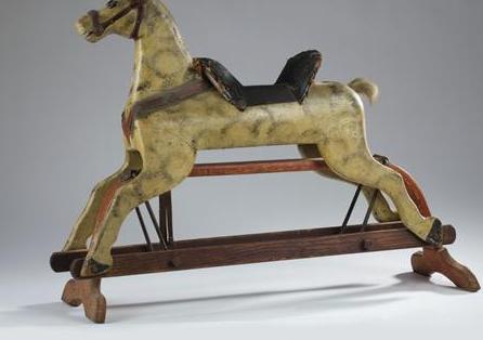 Appraisal: PAINTED DAPPLE GREY ROCKING HORSE ON A RED-PAINTED PLATFORM BASE