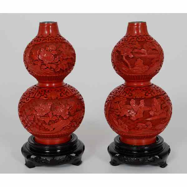 Appraisal: Chinese Double Gourd Vases Chinese Two red double gourd vases