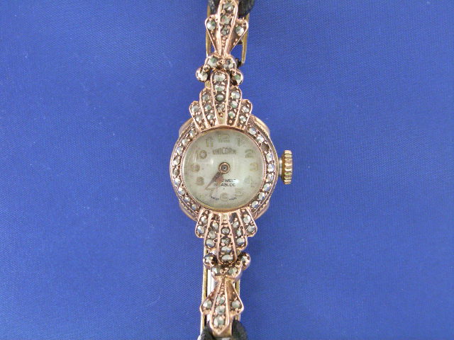 Appraisal: A lady's ct gold marcasite set manual wristwatch with a