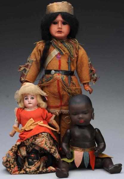 Appraisal: Lot of Antique Ethnic Dolls German Topsy-Turvy doll with white