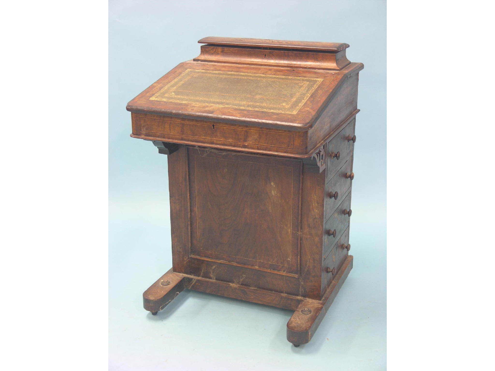 Appraisal: A Victorian walnut Davenport sloping top with stationery fittings four