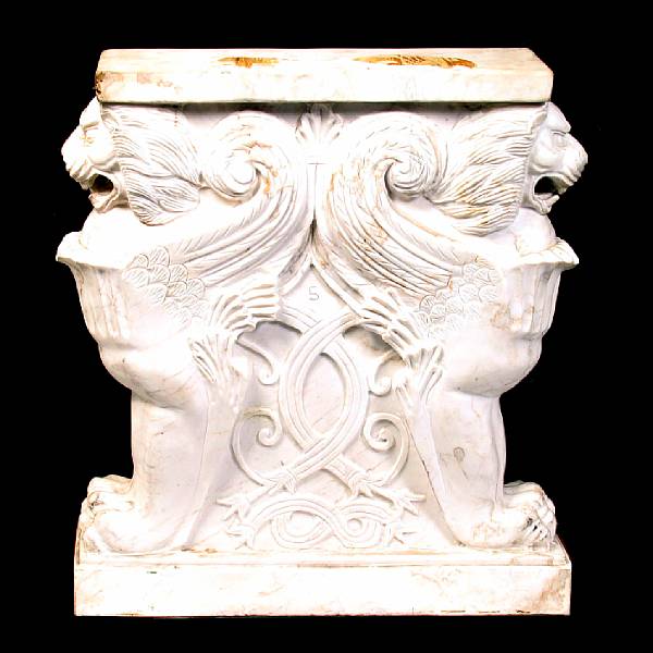 Appraisal: A carved marble support with winged griffin height in width