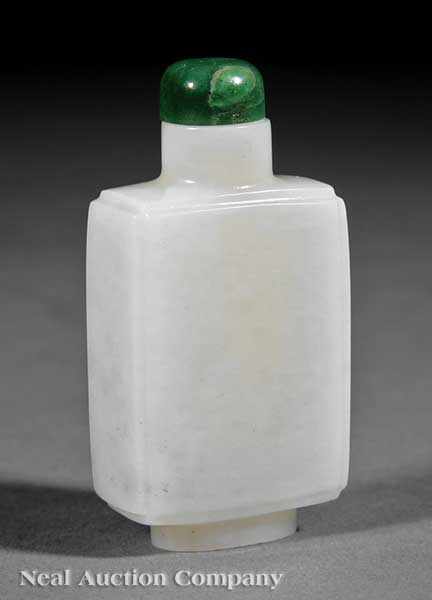 Appraisal: A Chinese Carved White Jade Snuff Bottle of rectangular section