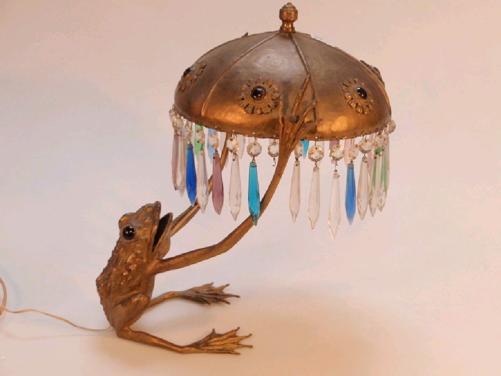 Appraisal: An unusual desk lamp in the form of a gilt