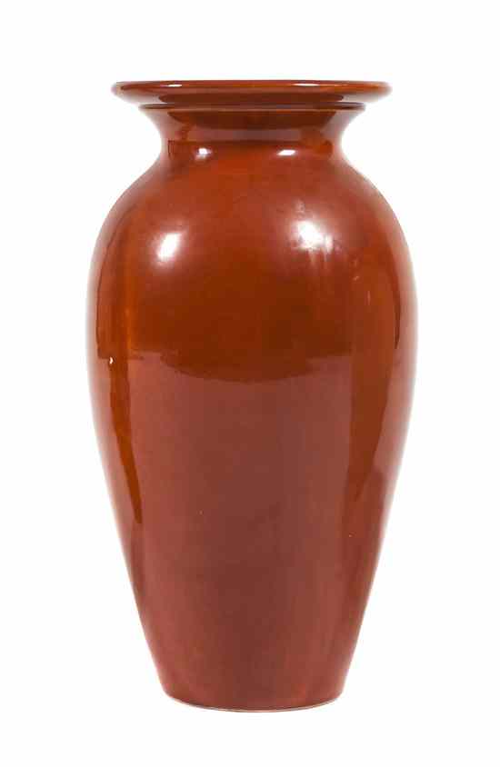 Appraisal: A Bauer Glazed Pottery Oil Jar of baluster form with