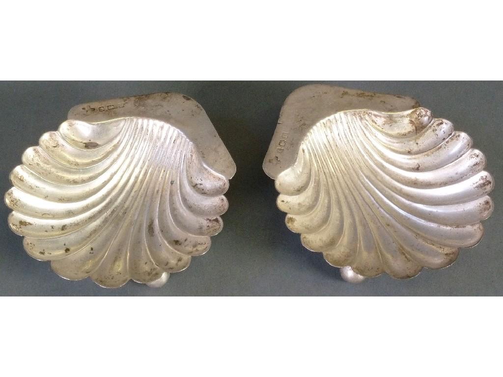 Appraisal: PAIR OF SILVER SHELL PATTERN DISHES each on three ball