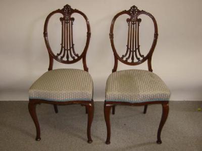 Appraisal: A VICTORIAN WALNUT FRAMED PART SALON SUITE upholstered in pale