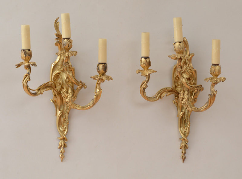 Appraisal: PAIR OF LOUIS XV STYLE GILT-BRONZE WALL SCONCES The tiered