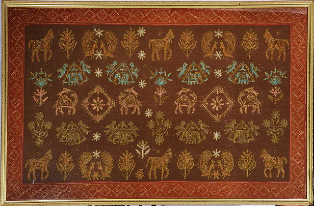 Appraisal: AN INDIAN NEEDLEWORK TEXTILE PANEL decorated with flora and fauna