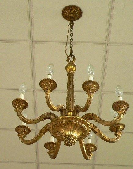 Appraisal: A gilt metal eight-branch eight-light chandelier with chain suspension and