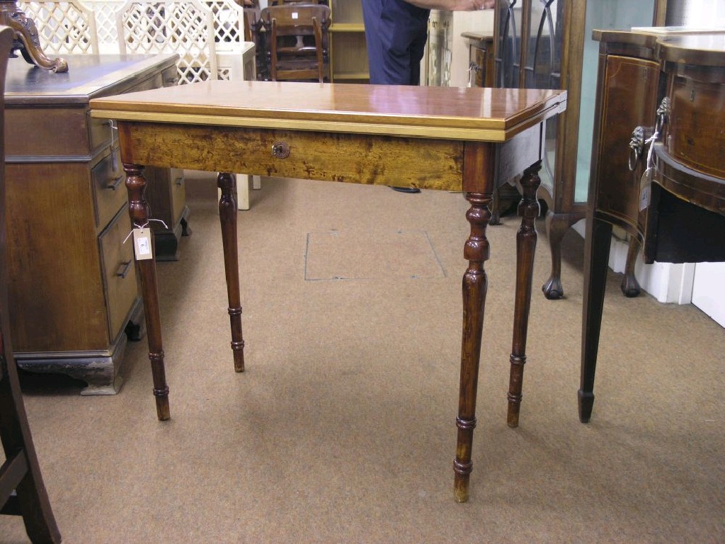 Appraisal: A Swedish reproduction mahogany tea table hinged rectangular top above