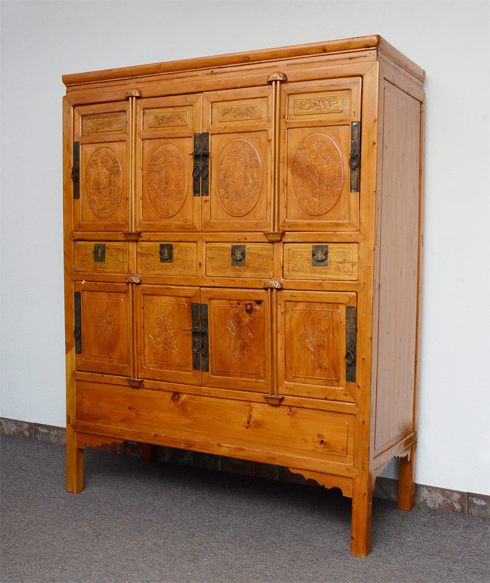 Appraisal: LARGE CARVED ORIENTAL CHEST doors over drawers over another doors