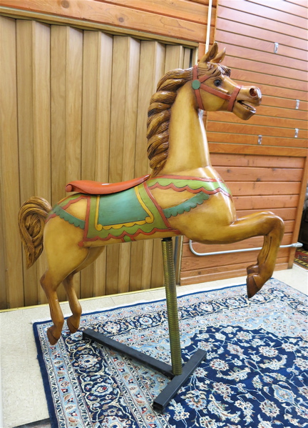 Appraisal: A CARVED AND PAINTED CAROUSEL HORSE ON STAND an inside