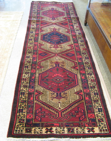 Appraisal: PERSIAN ZANJAN TRIBAL RUNNER Zanjan province northwestern Iran geometric design