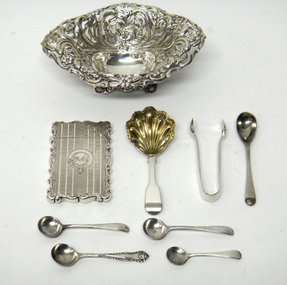 Appraisal: Silver comprising a Victorian shaped rectangular visiting card case with