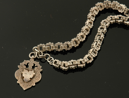 Appraisal: ANTIQUE STERLING SILVER FANCY LINK FOB CHAIN AND MEDALLION